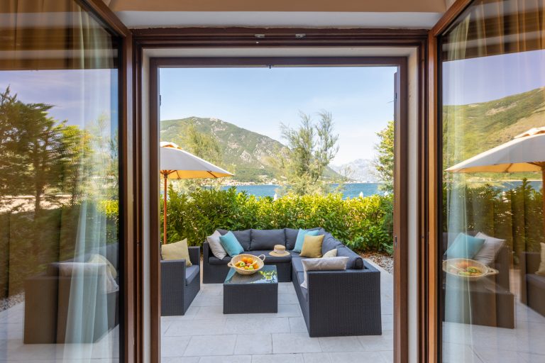 Waterfront villa located in community in Dobrota
